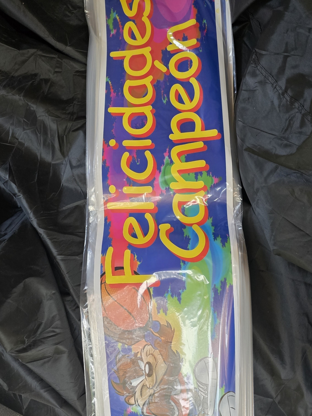 Felicidades Campeón Colorful Celebration Banner Looney Tunes.